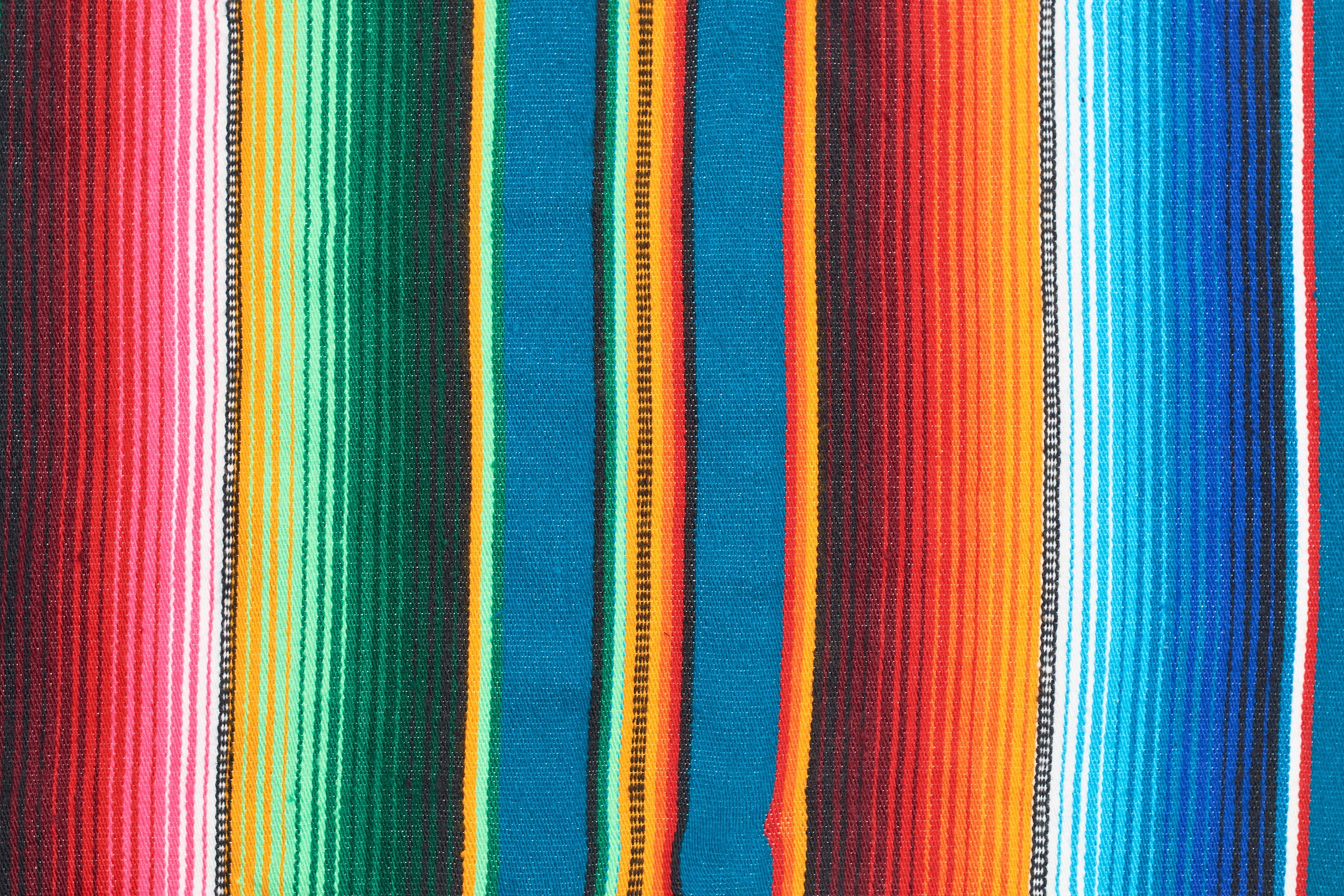 Texture of sarape or zarape, traditional Mexican textile.